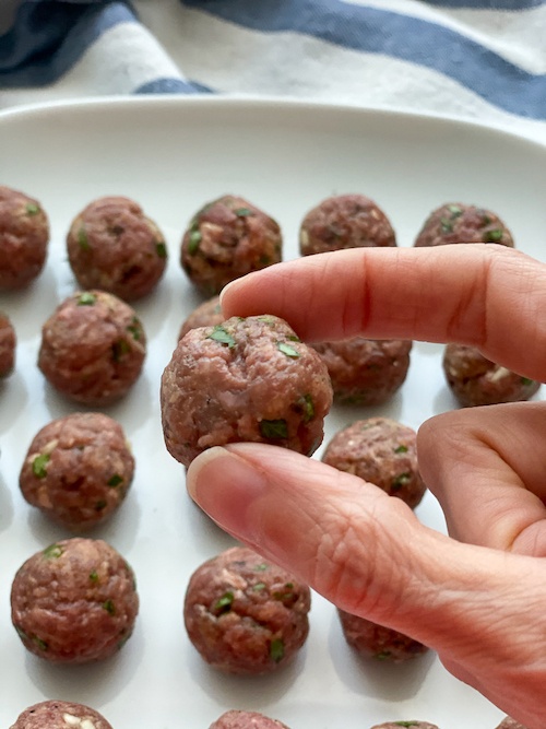 Authentic Italian Meatballs in hand