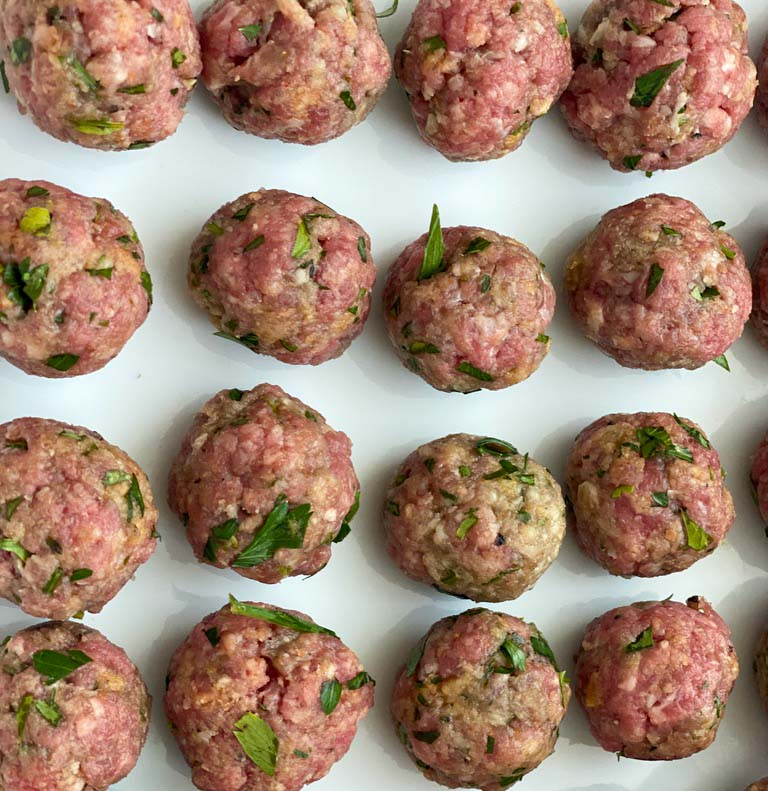 Italian ground beef meatballs on a tray