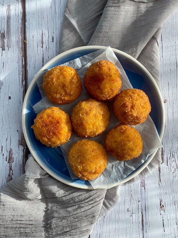 Sicilian Arancini on a blue plate