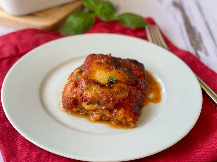 Eggplant Parmesan on a white plate