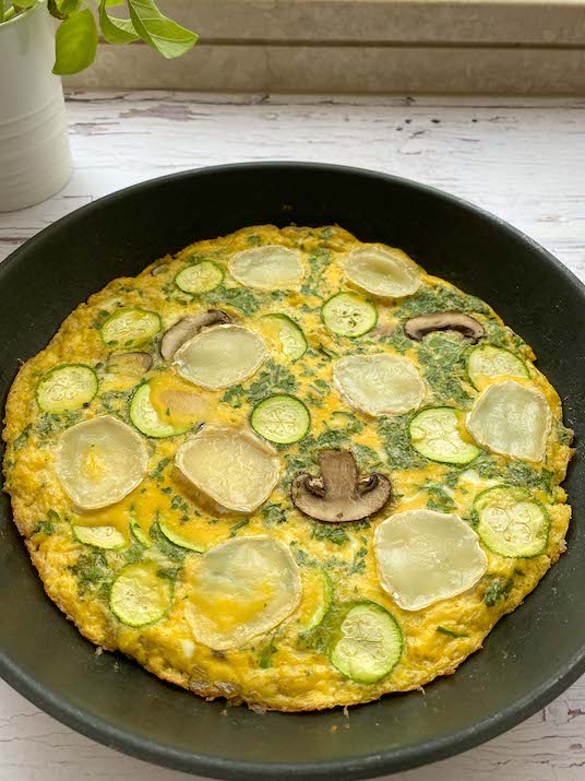 eggs cooked in a cast iron skillet