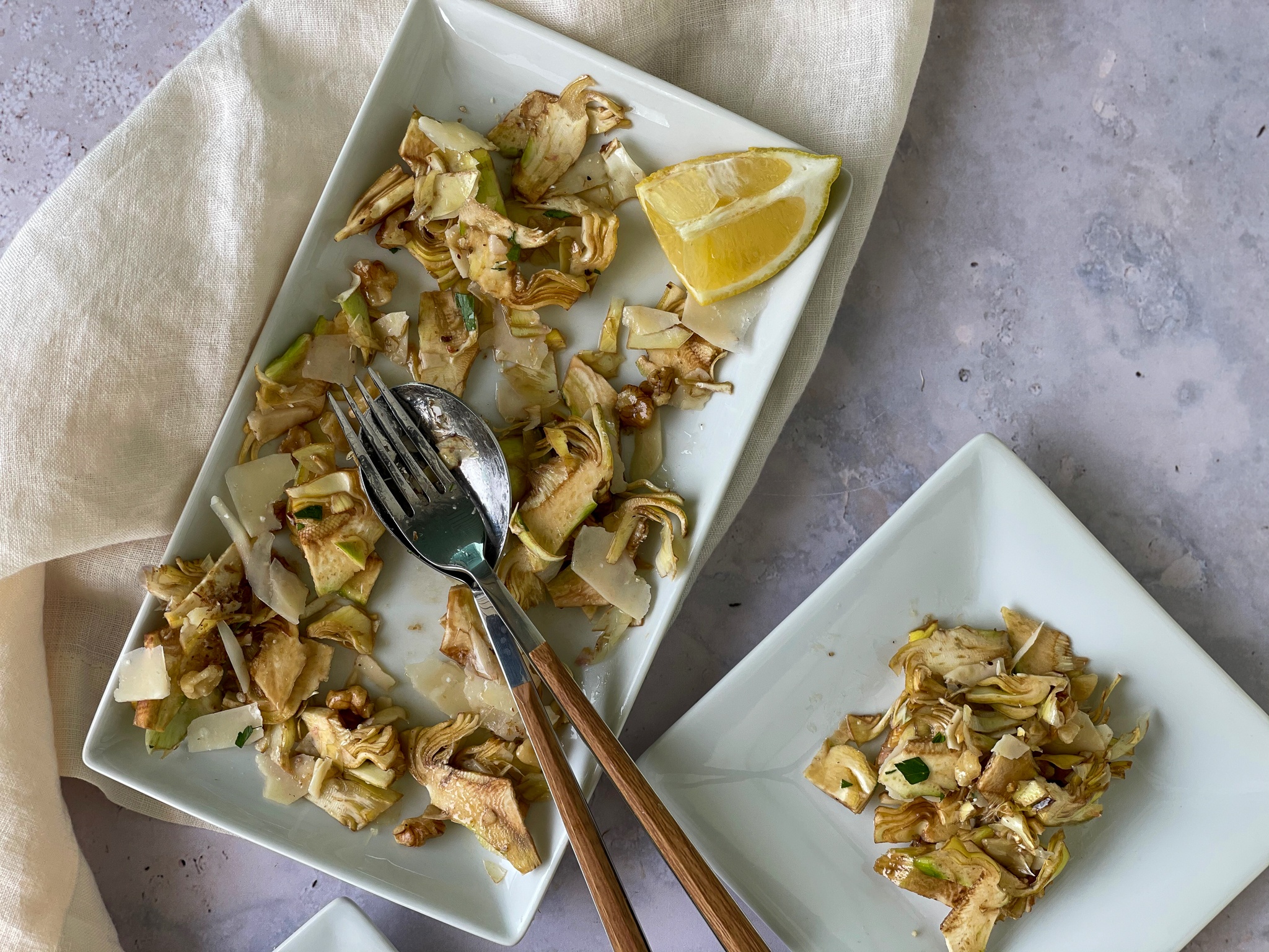 artichoke salad on white serving plate