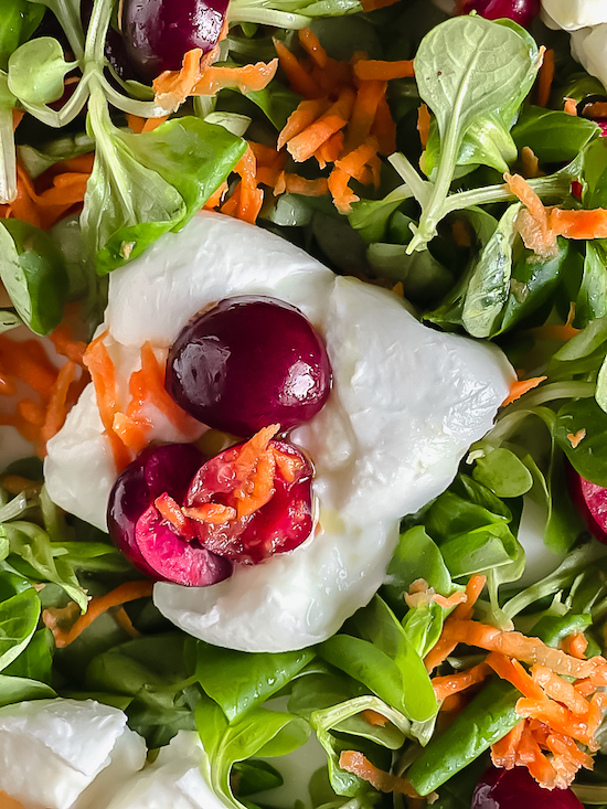 Cherry Mozzarella Salad with carrots on top