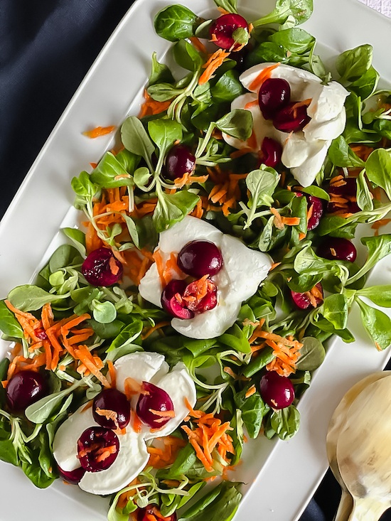 Cherry Mozzarella Salad on blue napkin