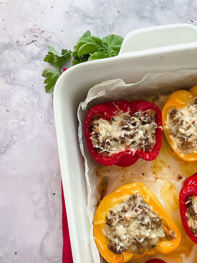 Details of baking dish with stuffed peppers