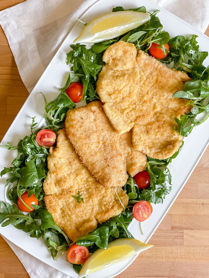 Pan-Fried-Breaded-Chicken-Breast-Italian_chicken-breast-in-serving plate