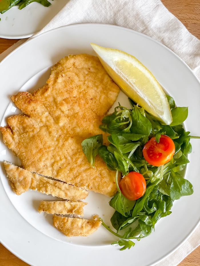 Pan-Fried-Breaded-Chicken-Breast-Italian_chicken-breast-sliced in plate