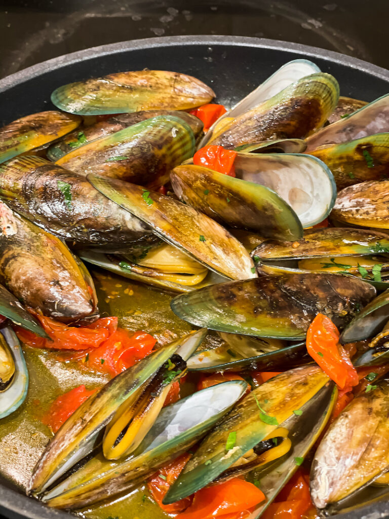 mussels cooking in a pot