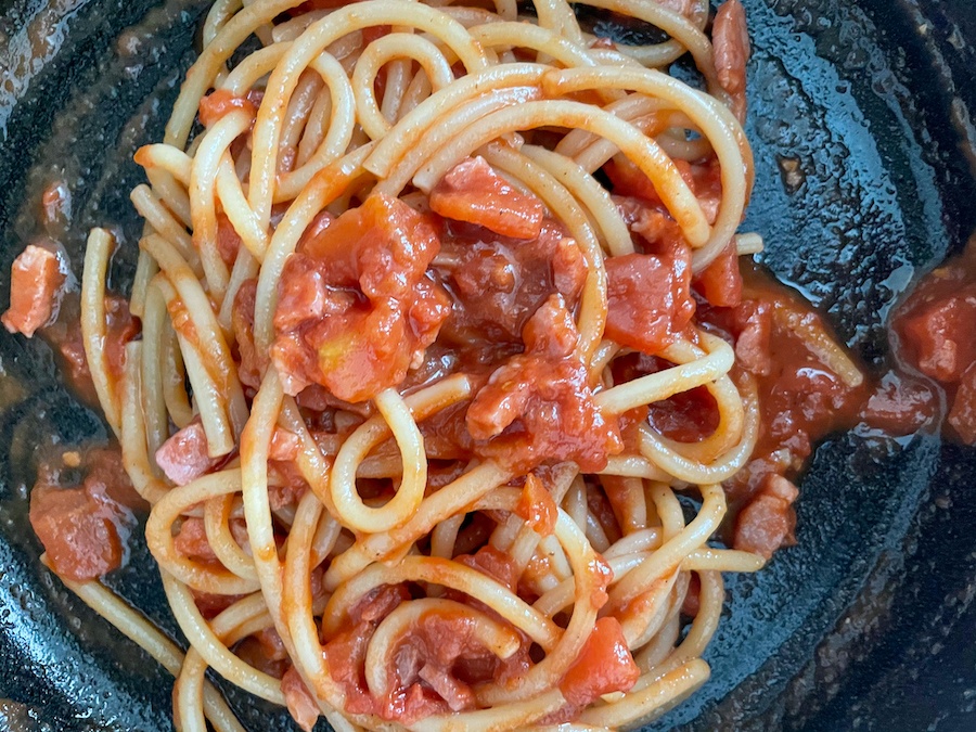 Bucatini in the amatriciana sauce in a skillet