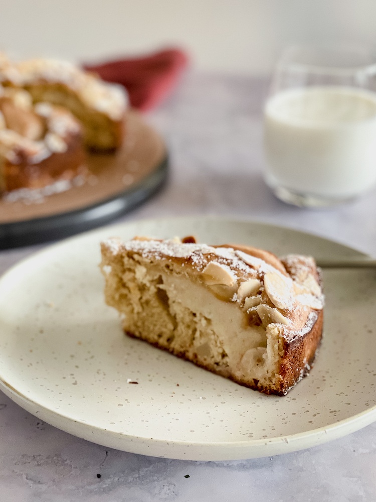Italian Pear Cake with glass of milk in background