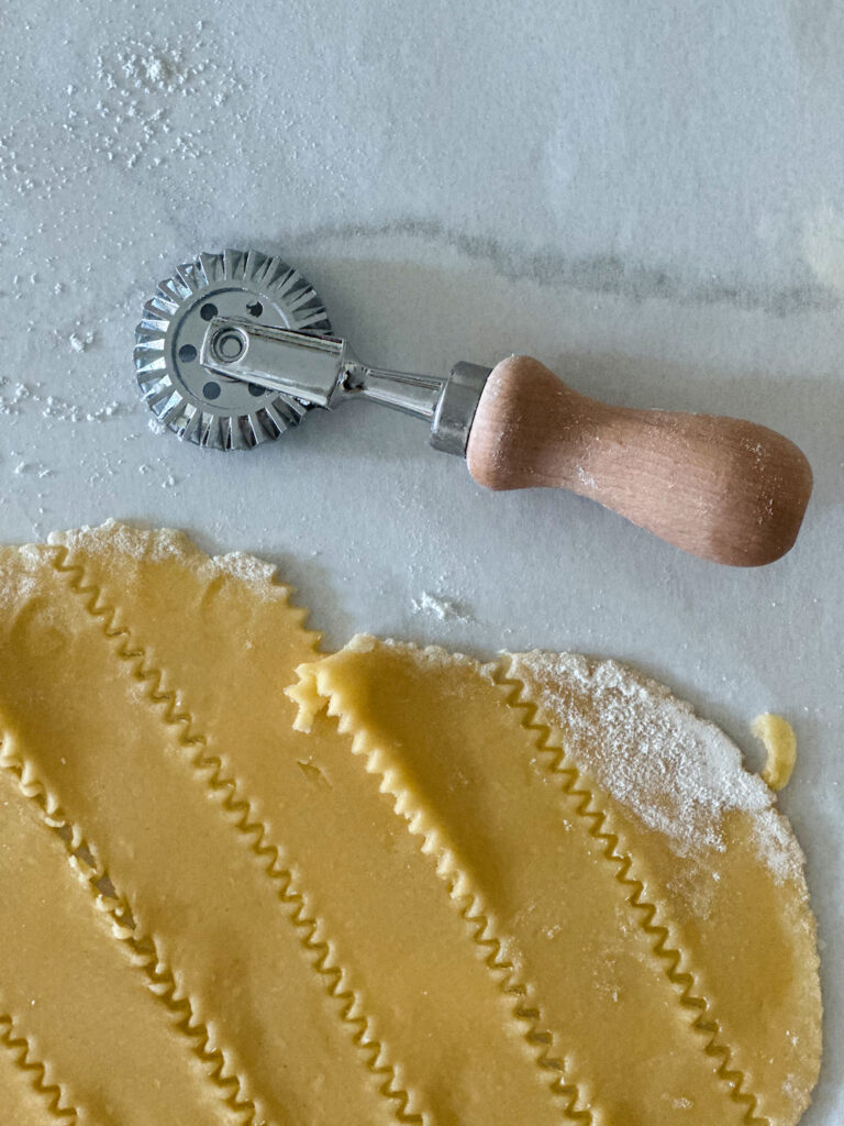 strips of pasta cut with a pastry cutter.