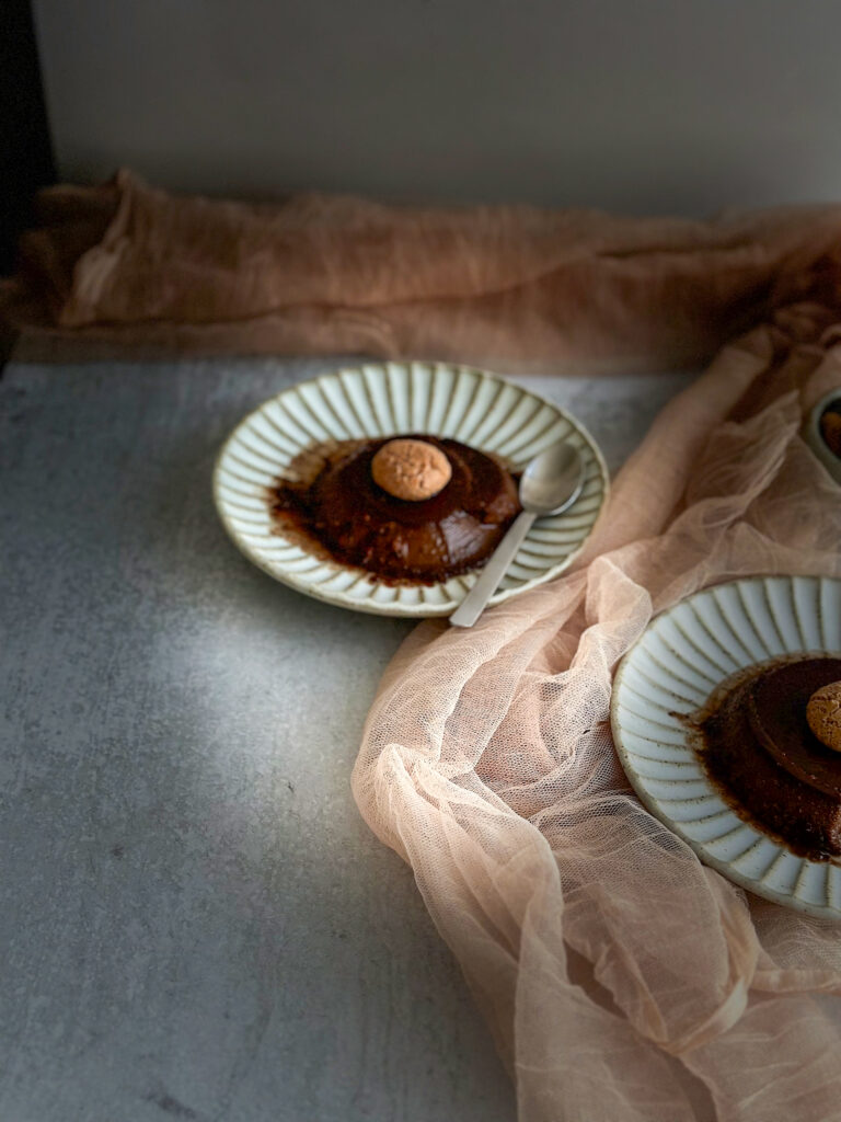 Bonet on a plate over a table in the dark shadow