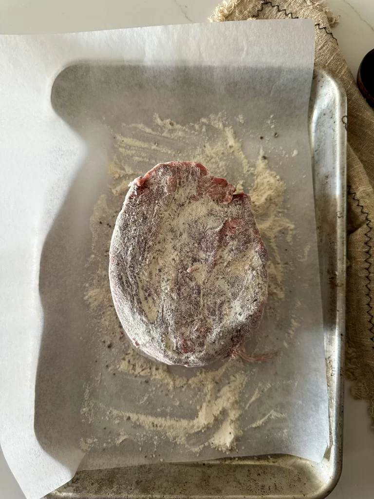Beef chuck dredged in flour