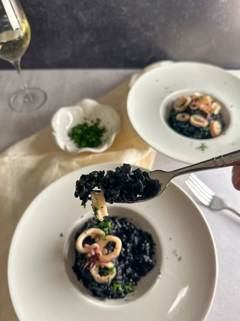 Bite of risotto on a fork
