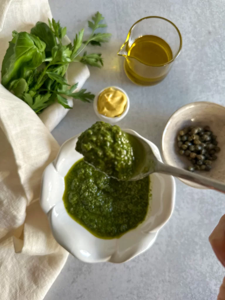 Salsa verde in a spoon