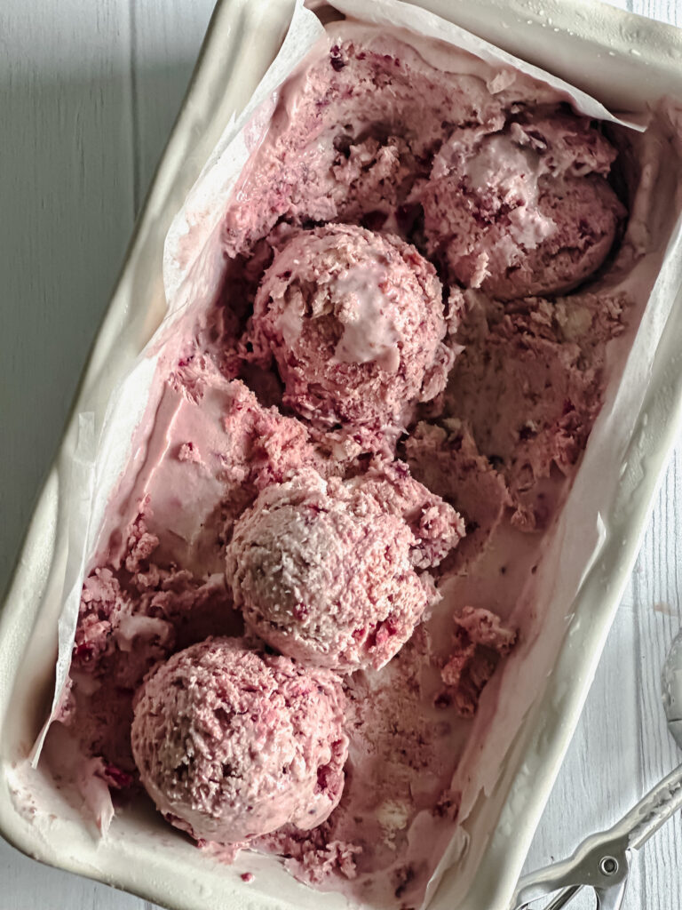 Scoops of cherry ice cream in a baking tray