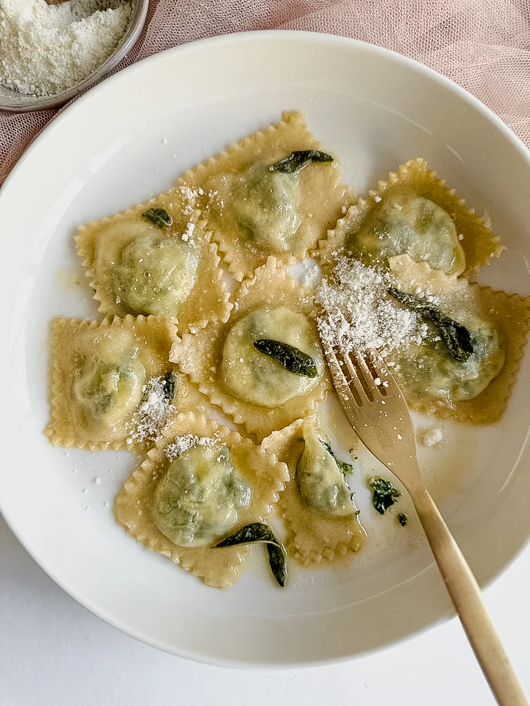 Plate of spinach ricotta ravioli