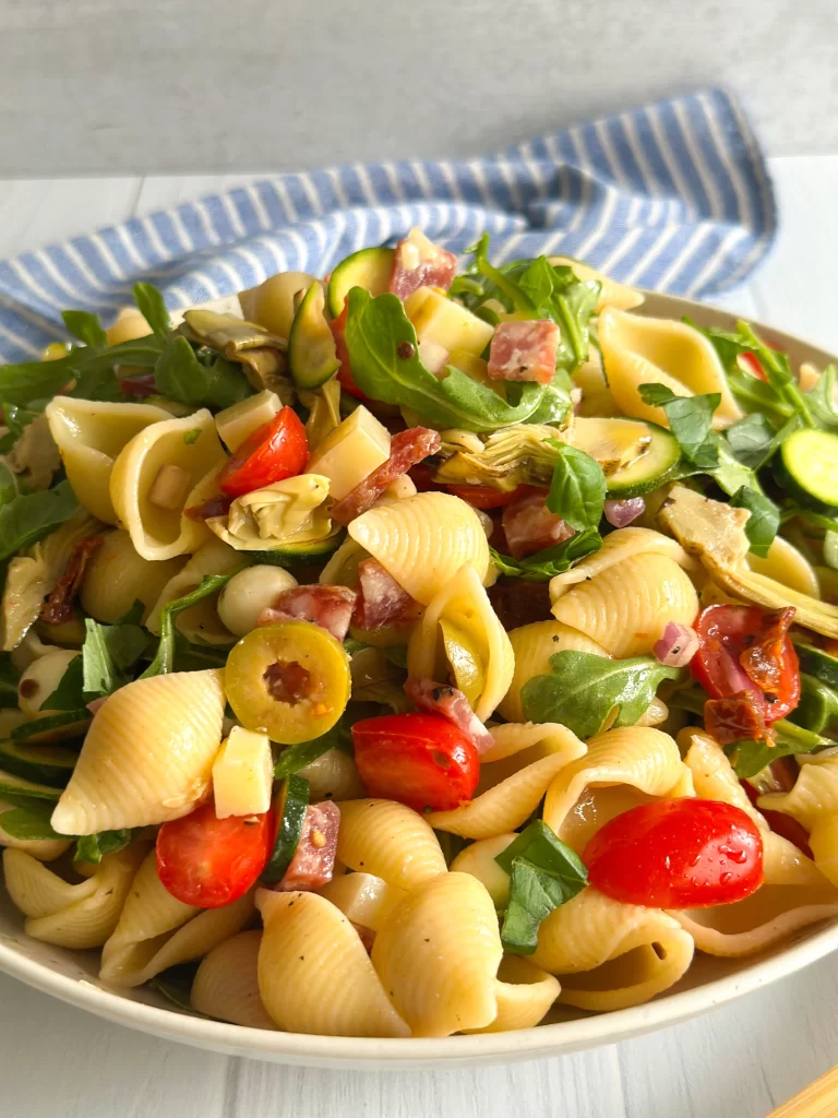 Close view of a bowl of pasta salad.