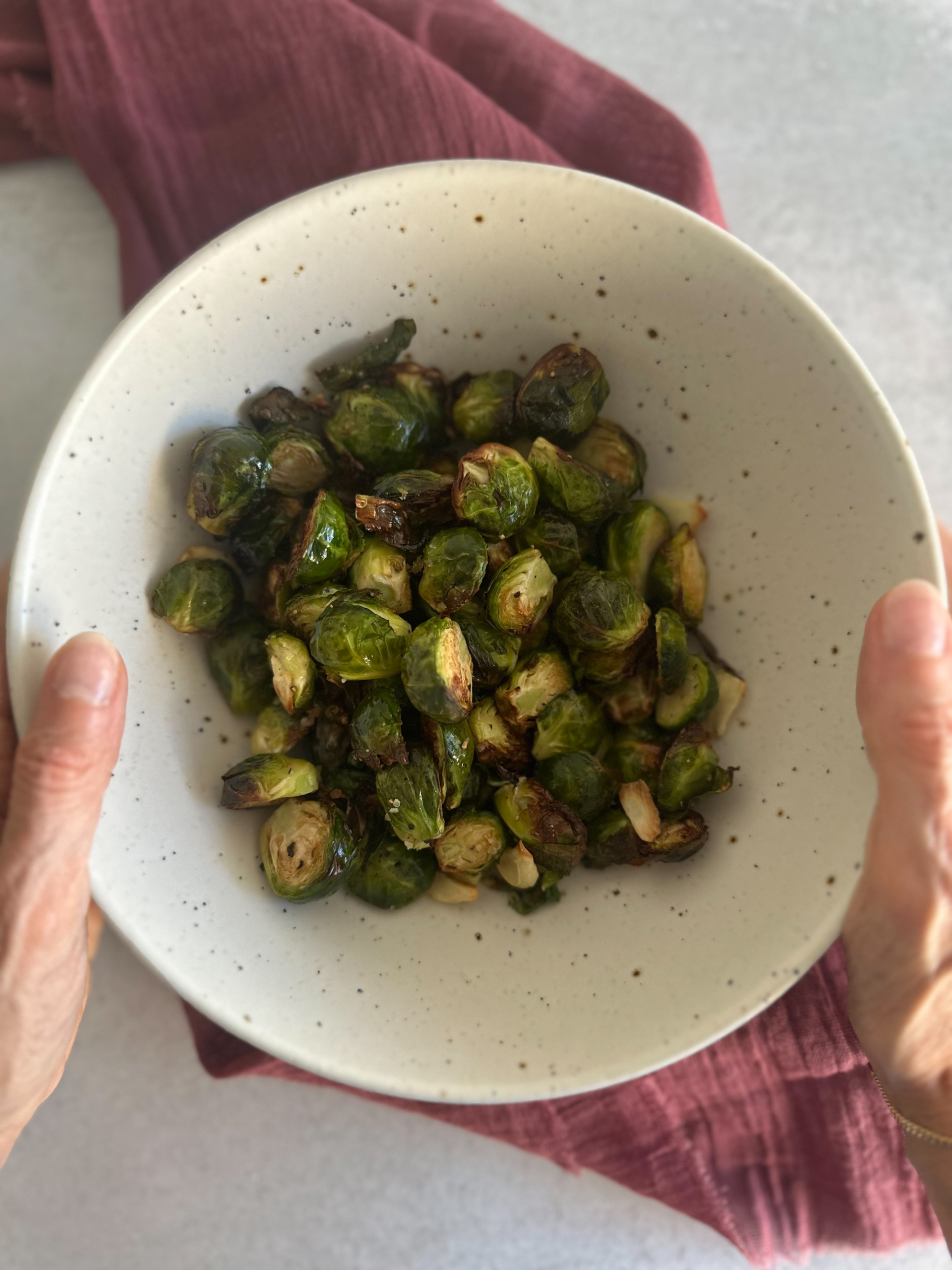 Air Fryer Brussels Sprouts in hands