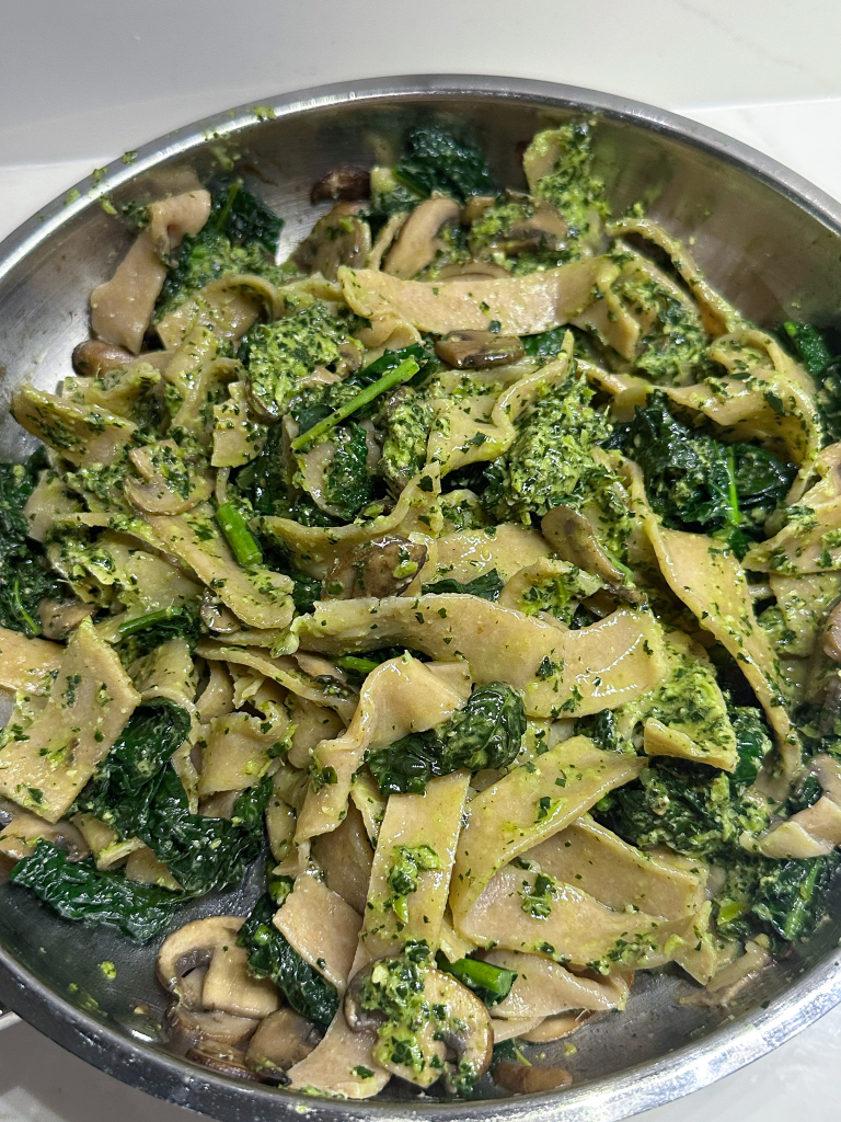 Spelt Tagliatelle Pasta with Kale & Walnut Pesto and Mushroom in the pot