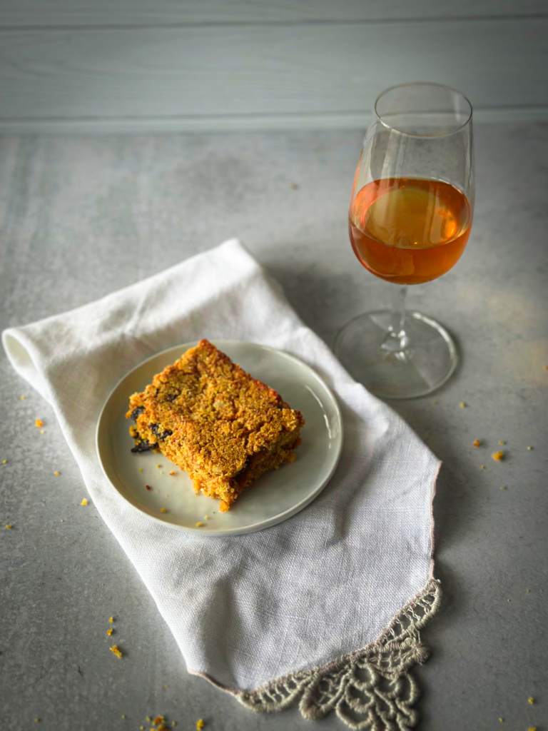 Epiphany cake served with a glass of sweet wine