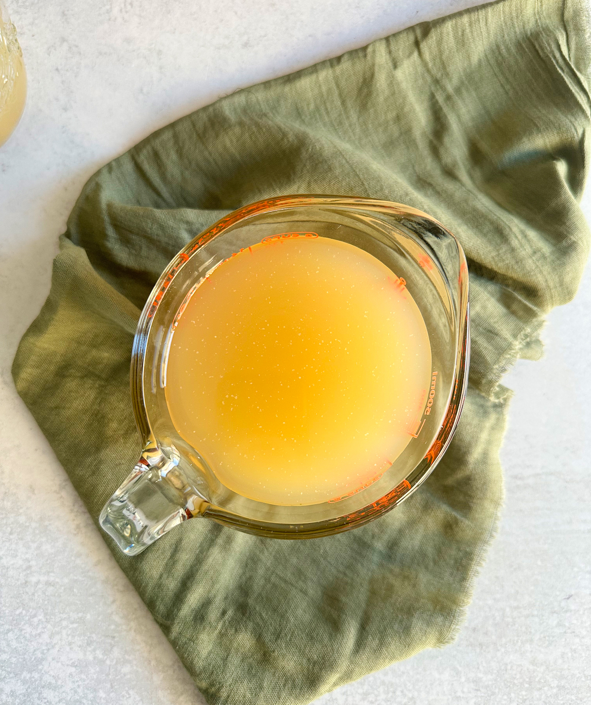 Traditional Italian chicken broth strained and golden