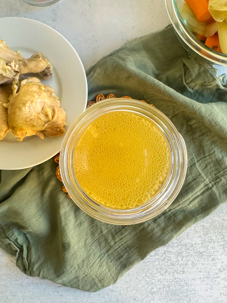 Traditional Italian chicken broth strained and golden