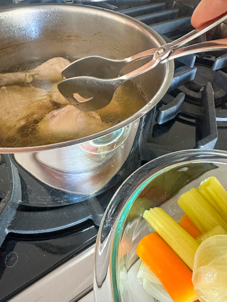 Remove vegetable, chicken and strain in a jar.