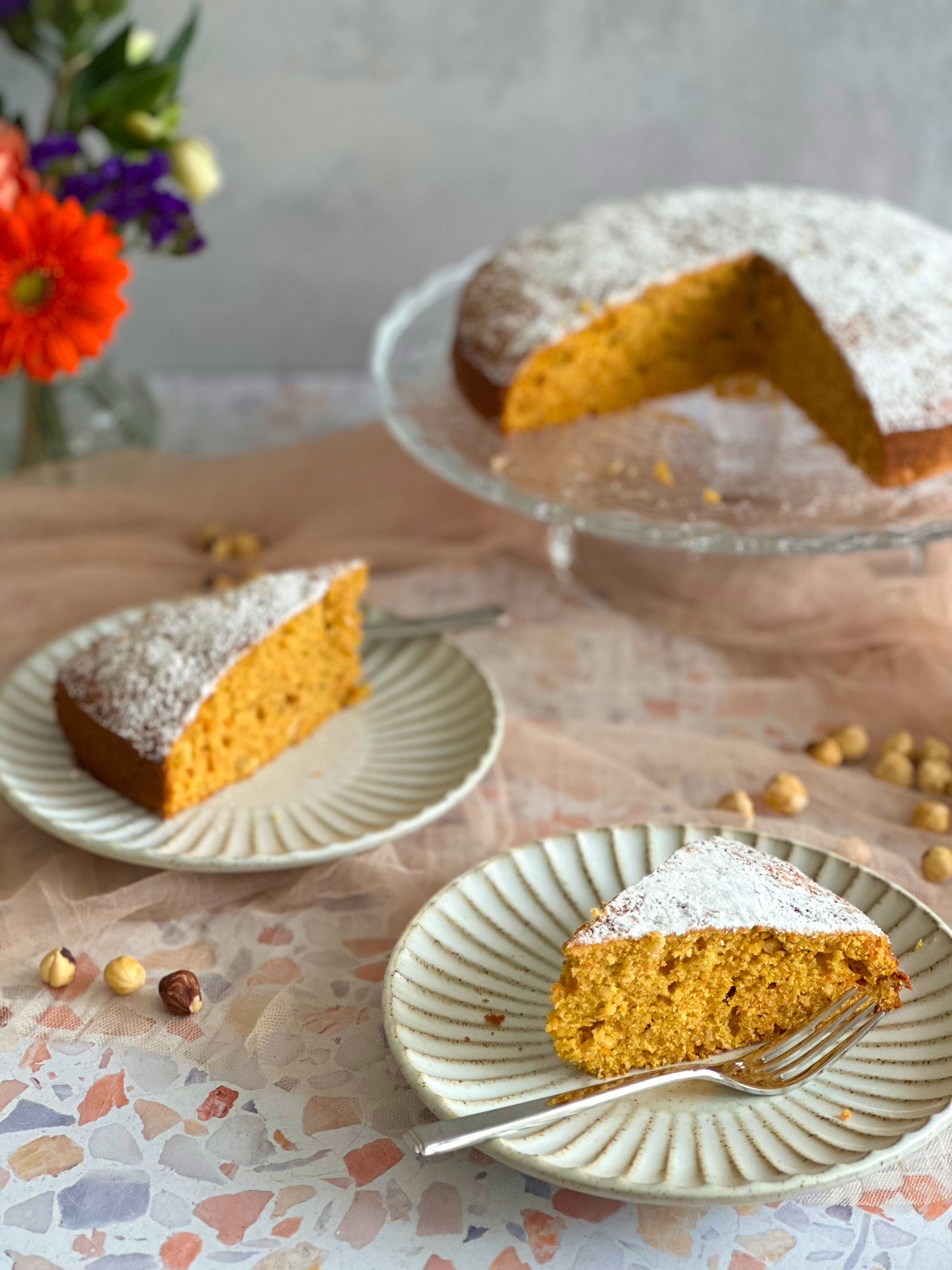 Carrot Orange Cake sliced on serving plates