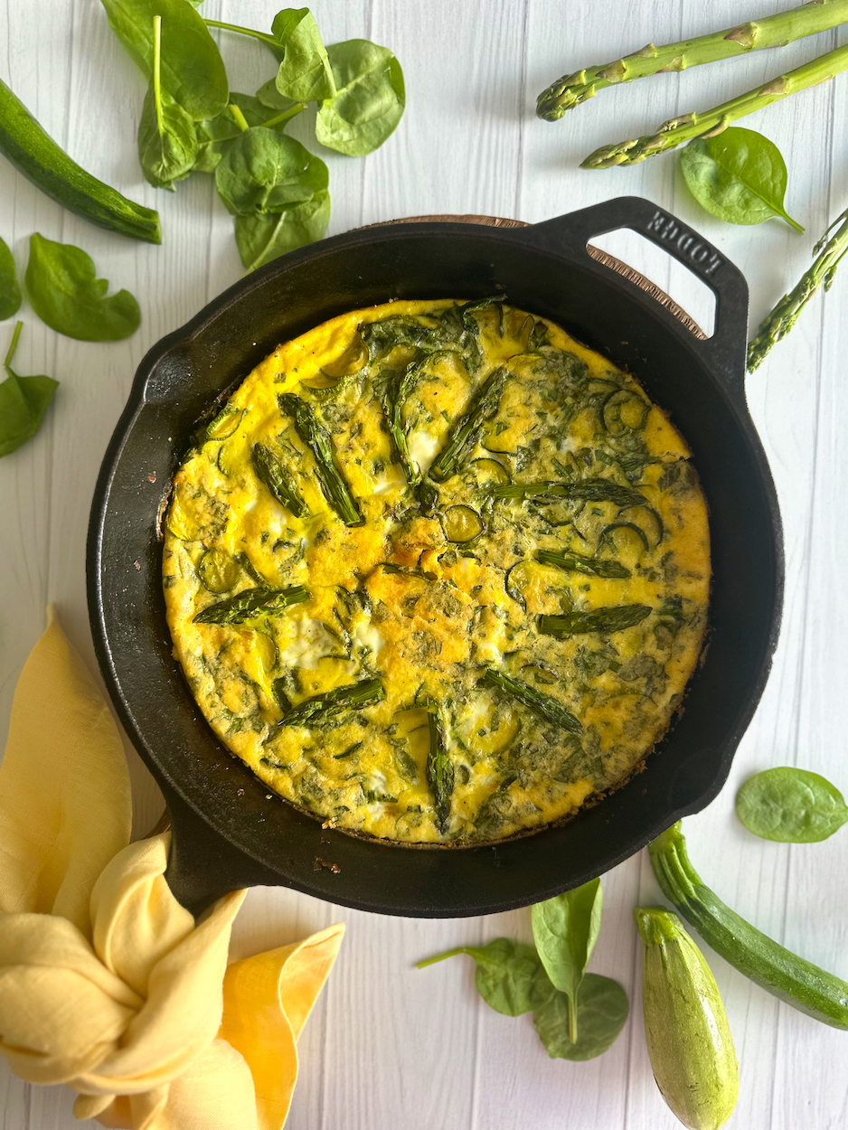 Vegetable frittata baked on a wooden table
